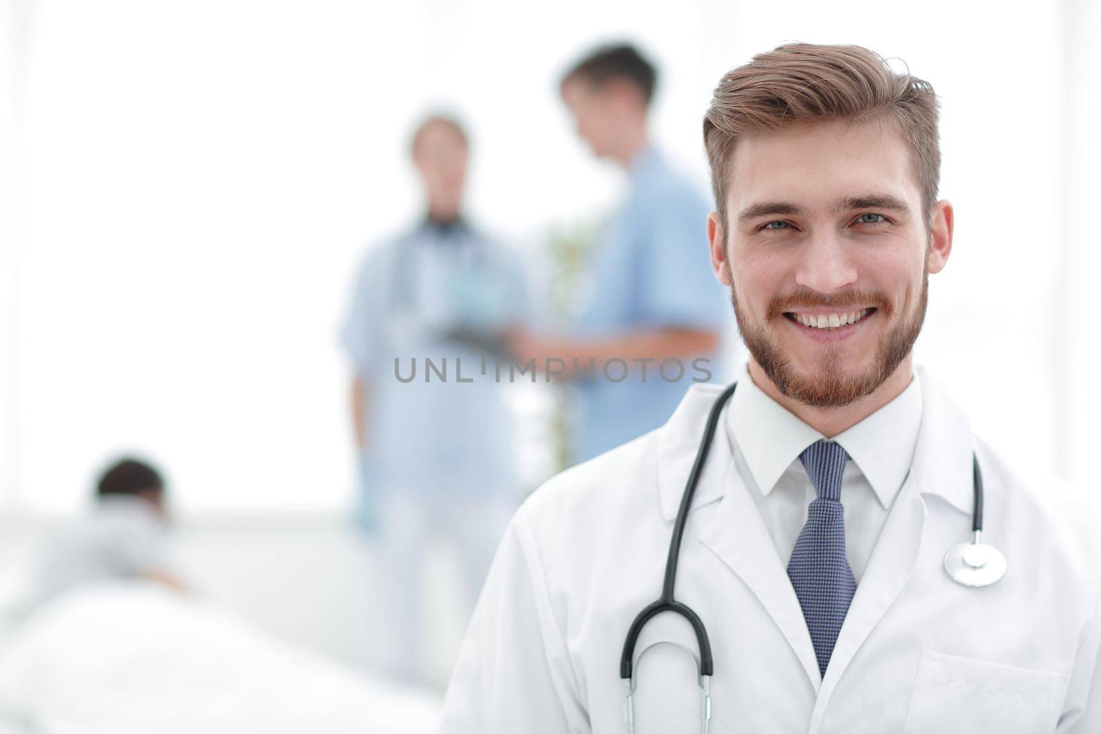 smiling doctor on blurred background.photo with copy space