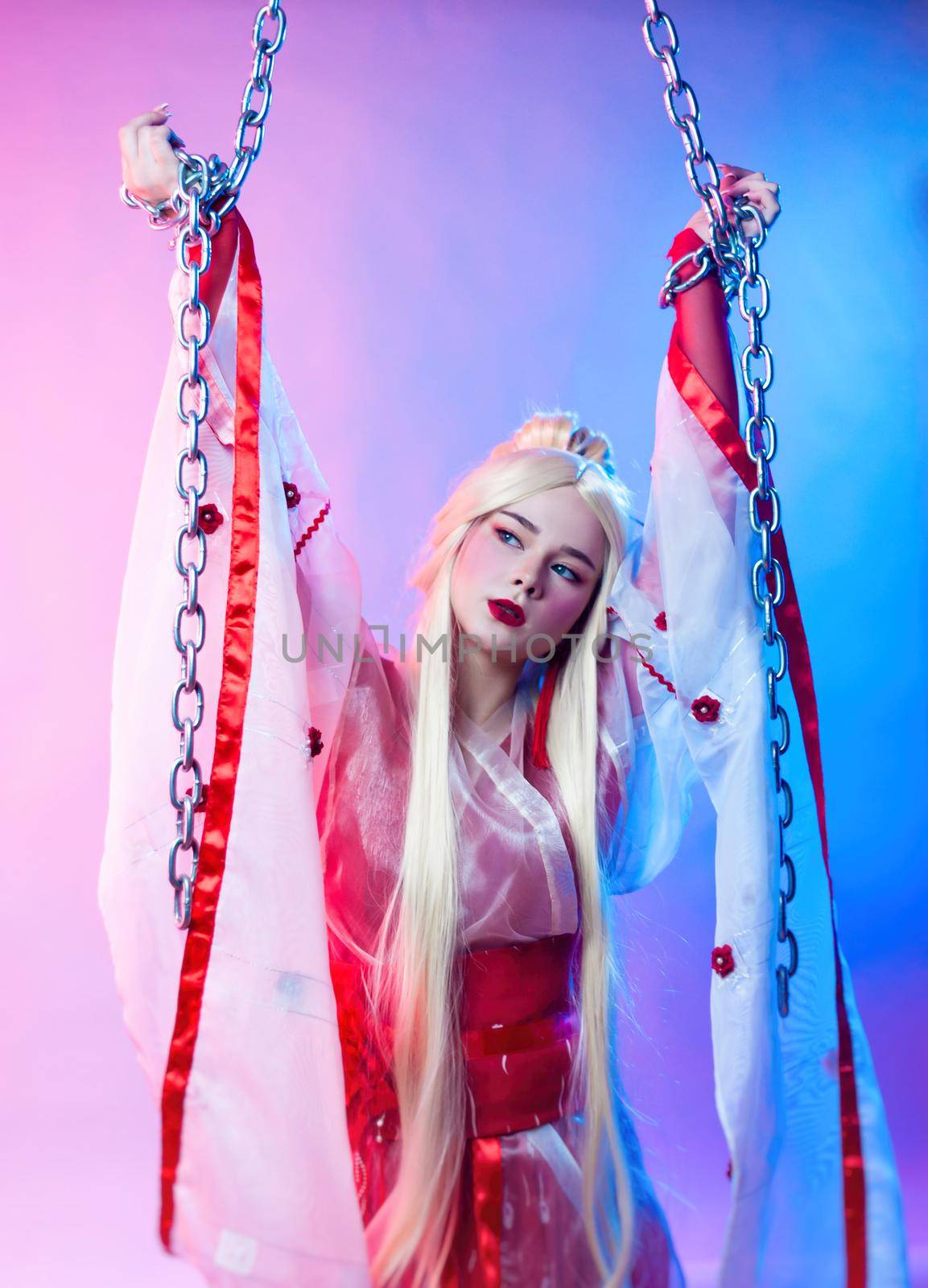 a woman in a geisha costume chained in large chains by Rotozey