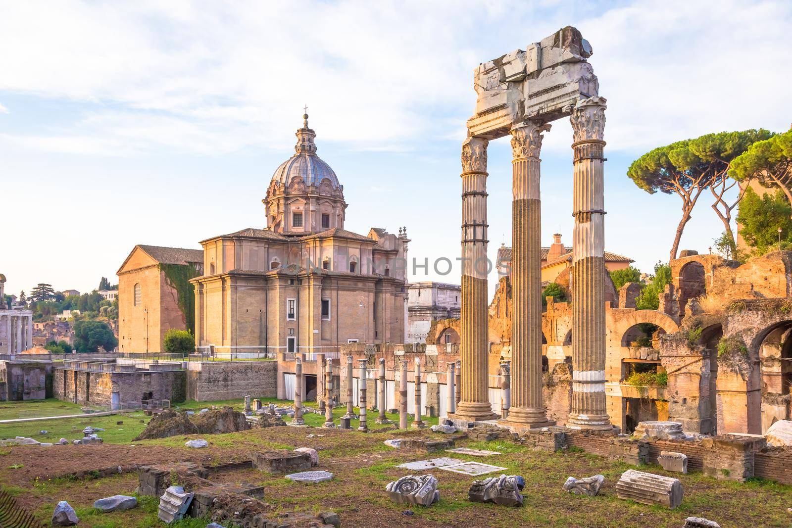 ROME, ITALY - CIRCA AUGUST 2020: sunrise light with blue sky on Roman ancient architecture.