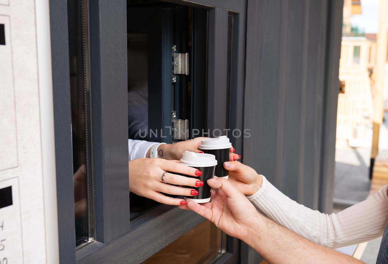 Couple takes takeaway coffee. Take a break from work and study and go outside