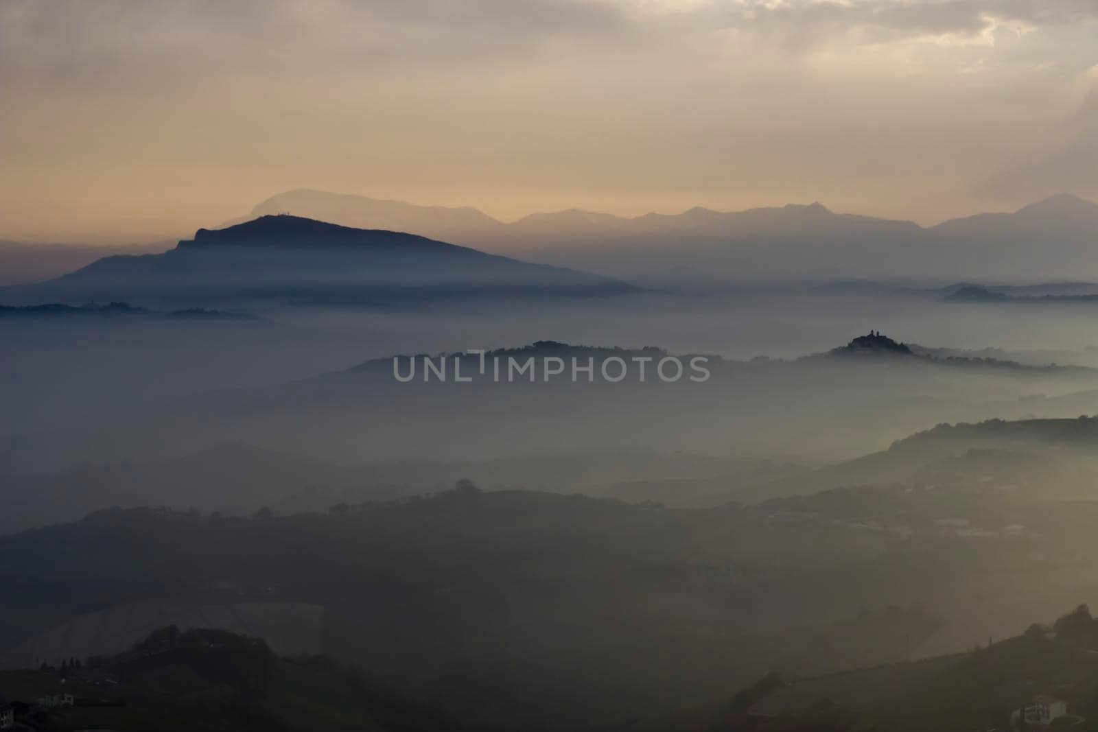 The valleys near Ripatransone are covered in mist in the morning