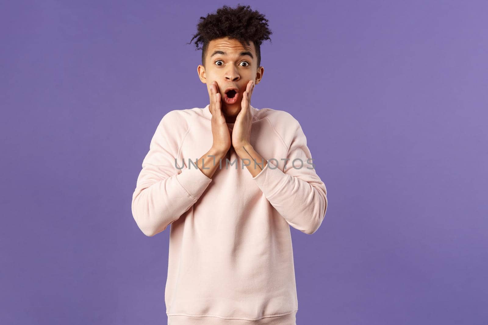 Oh my gosh. Portrait of amazed, speechless excited hispanic guy staring overwhelmed at something stunning, watching incredible performance, react shocked and amazed, purple background by Benzoix