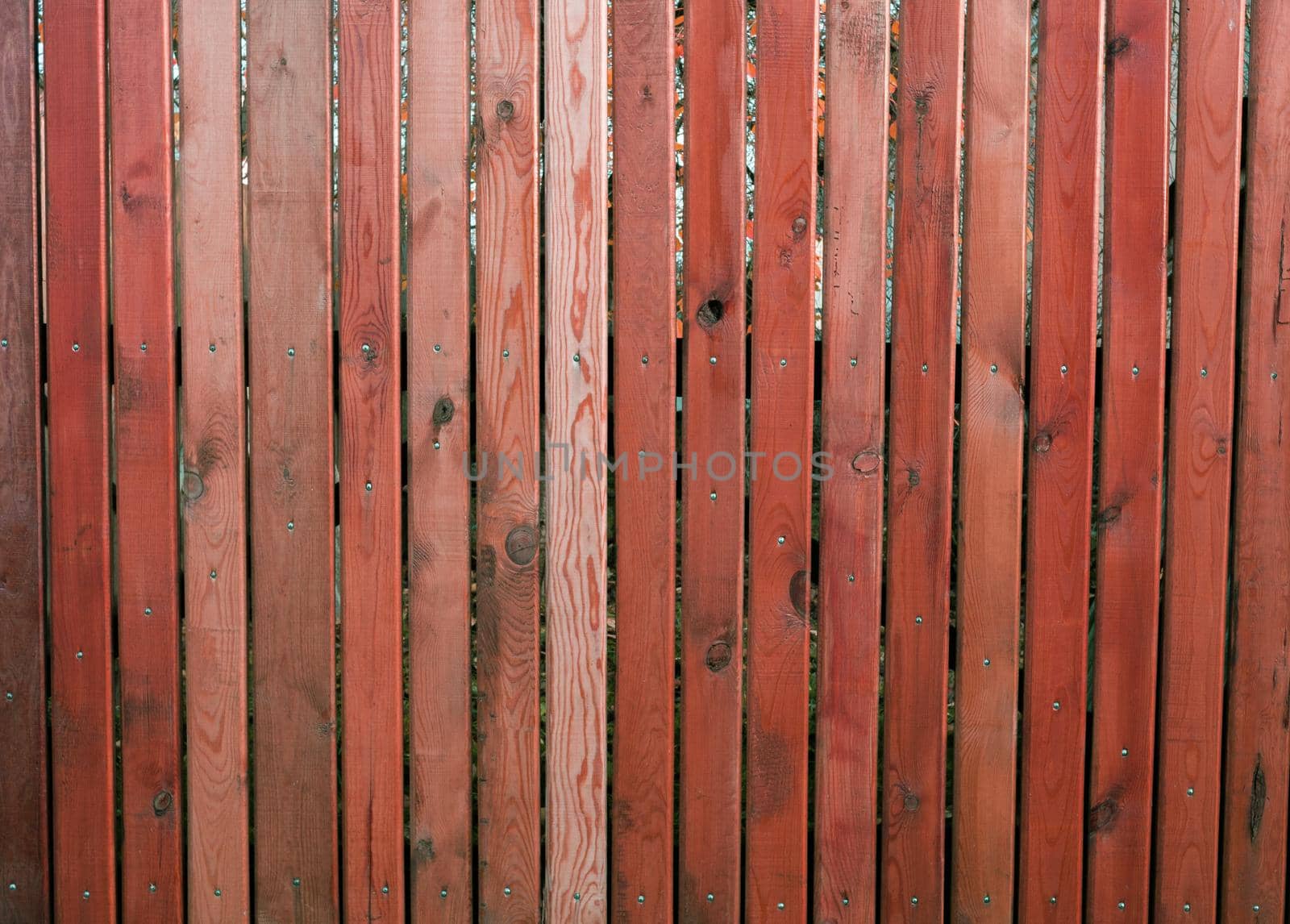 Texture of brown boards on the fence.