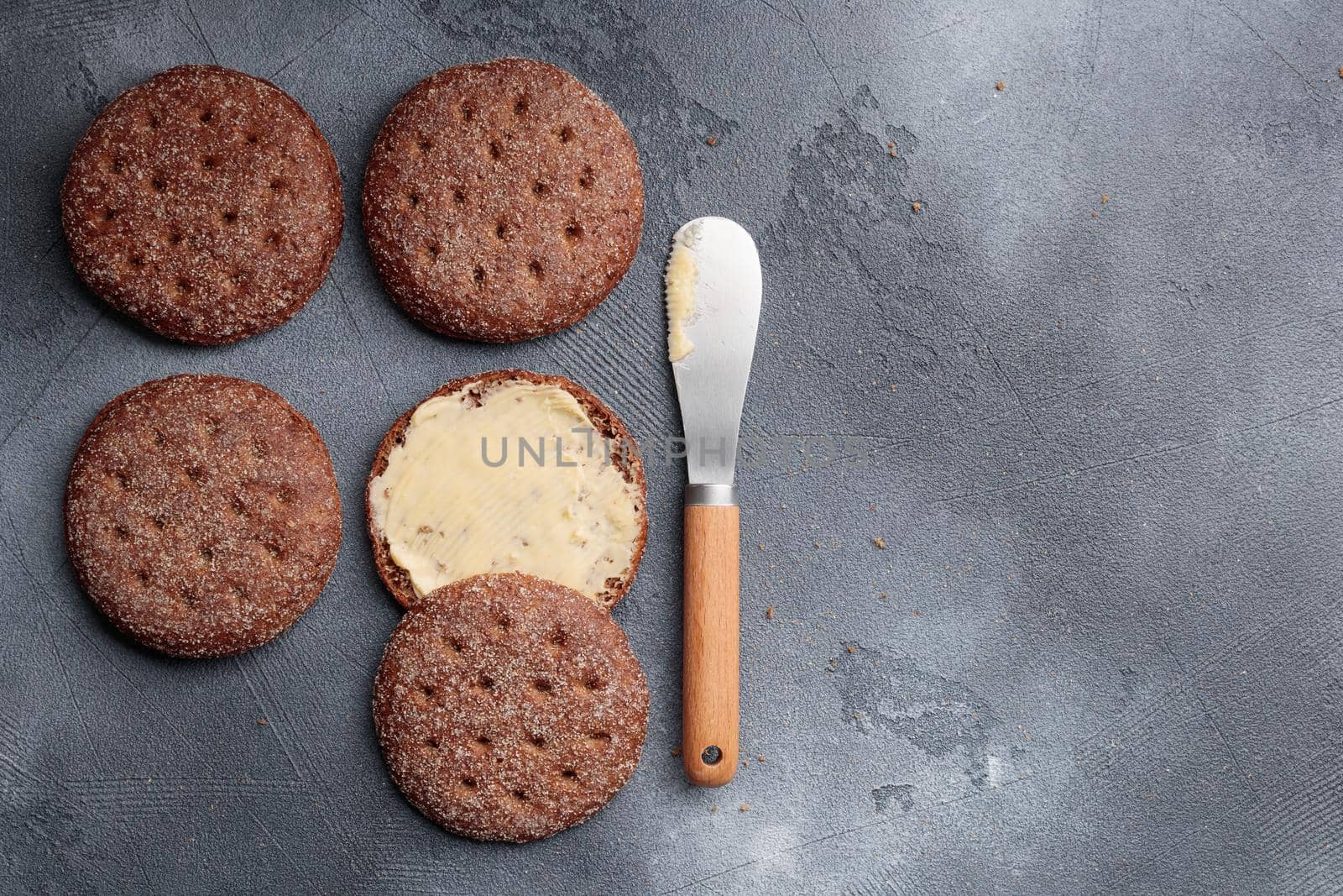 Ruisleipa - traditional Finnish rye bread on a gray concrete background