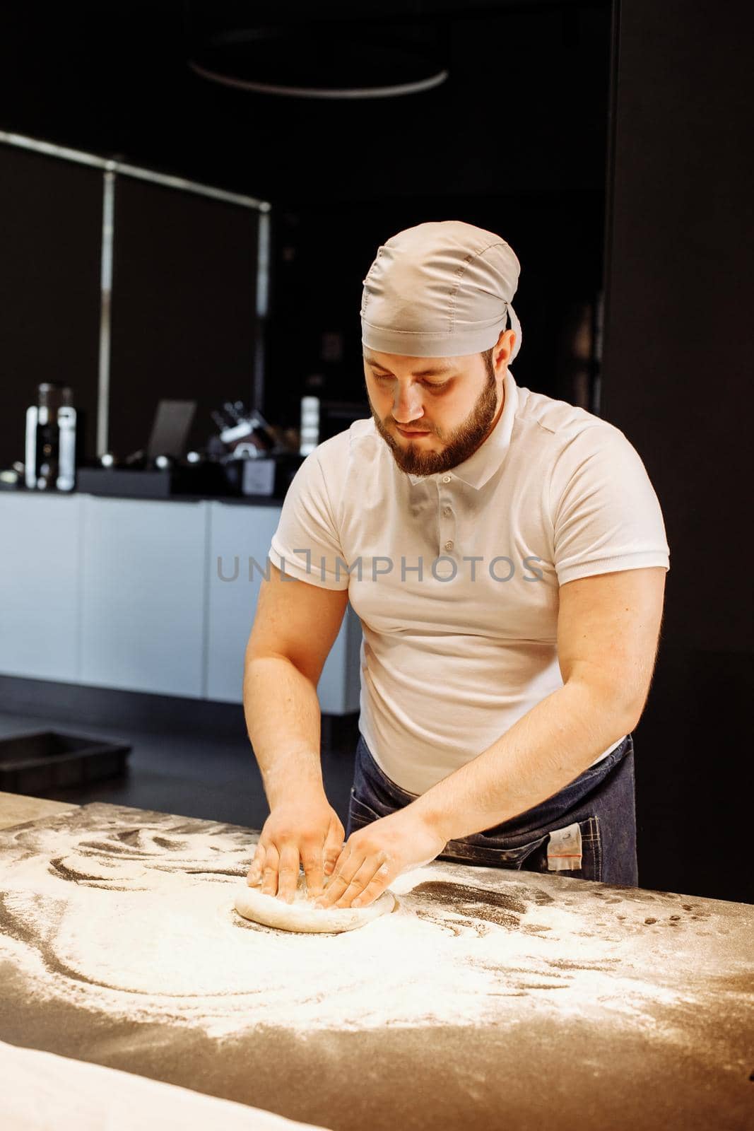 Making dough by hands at bakery or at home.