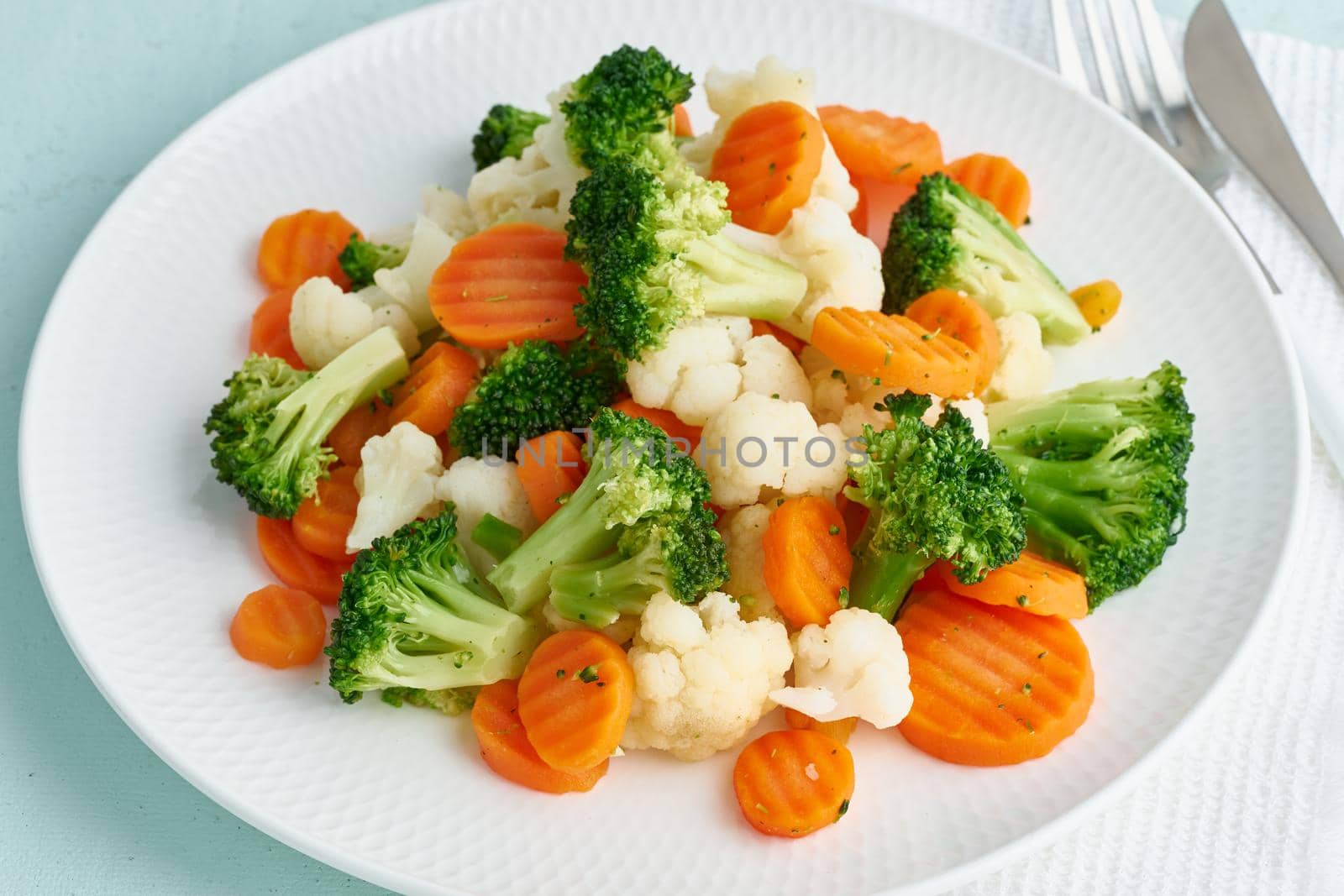 Mix of boiled vegetables. Broccoli, carrots, cauliflower. Steamed vegetables for dietary low-calorie diet. FODMAP, dash diet, vegan, vegetarian, macro, close up