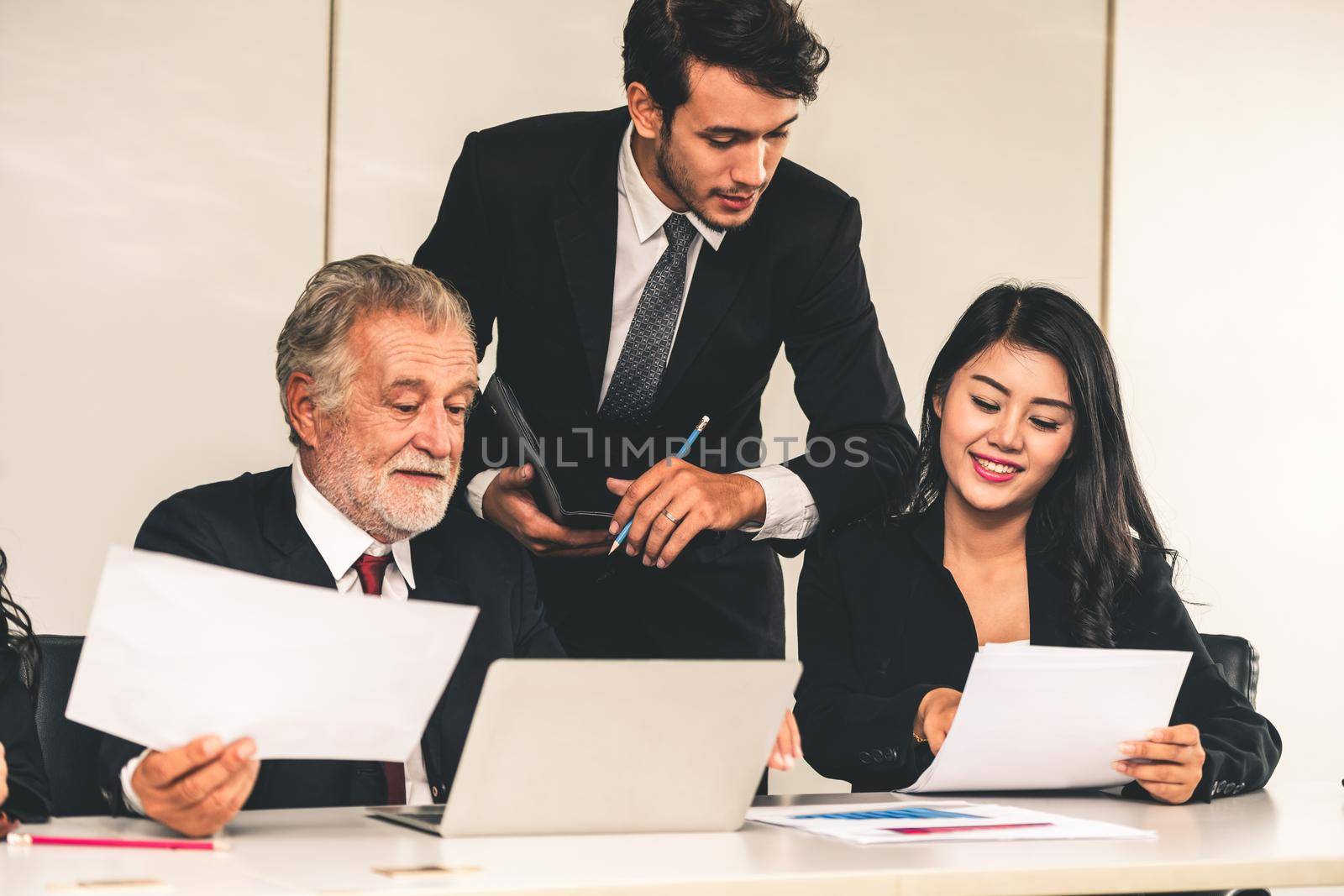 Business people, manager and employee in meeting. by biancoblue