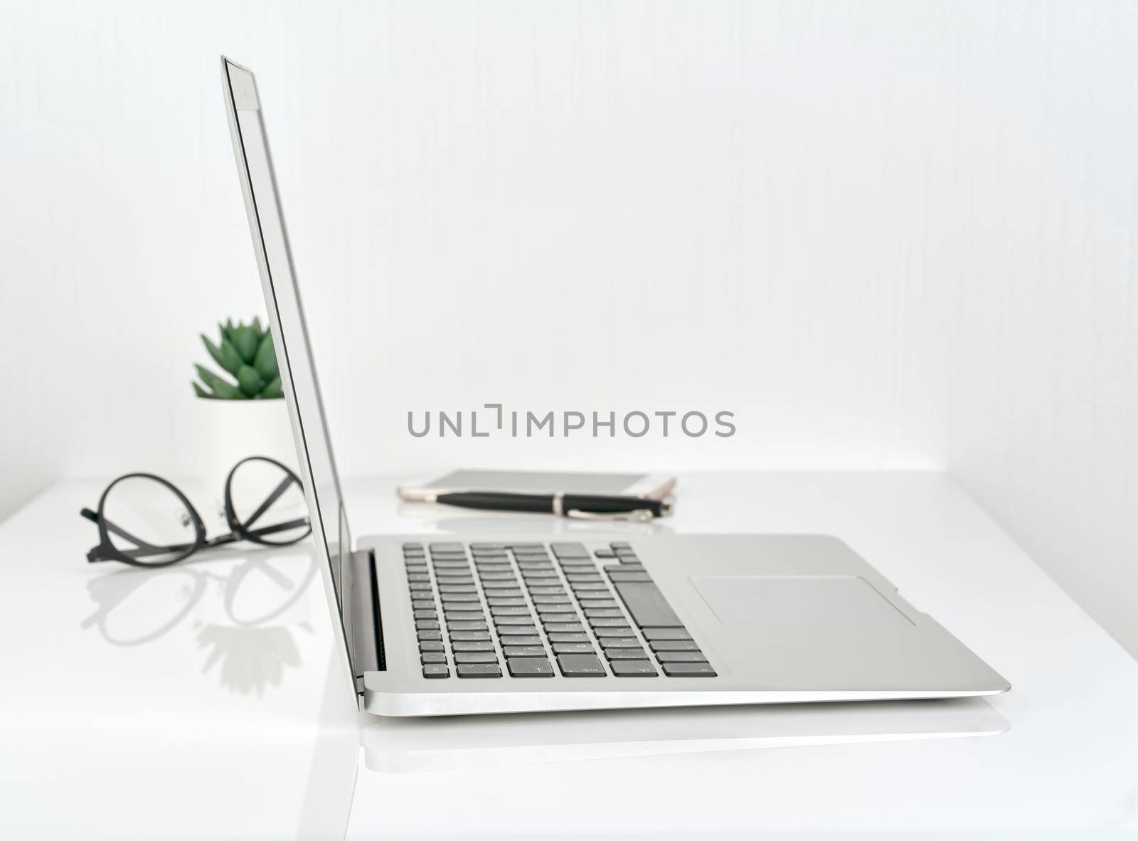 Working Space or Office desk, concept of study, white wall background by NataBene