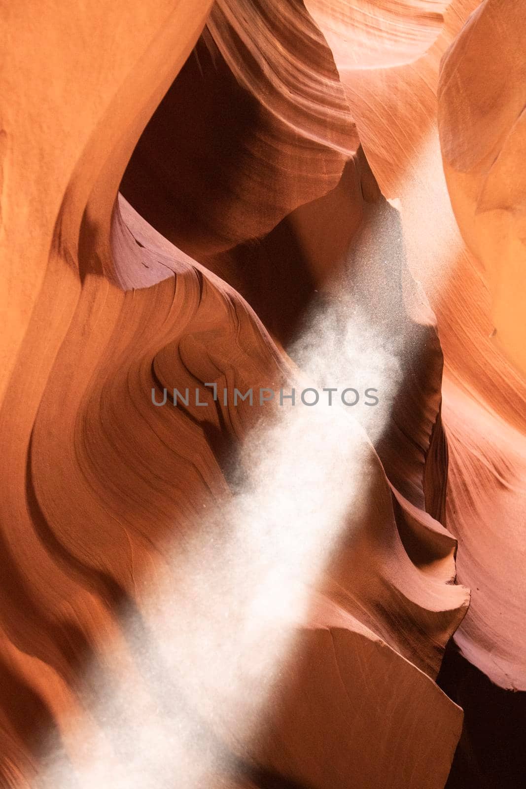 Rays of sunlight coming into tourist Antelope Canyon in the USA