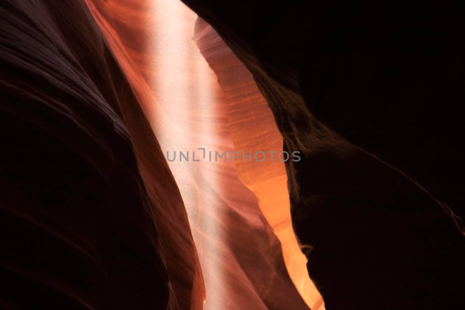 Rays of light entering in tourist Antelope Canyon in Arizona USA
