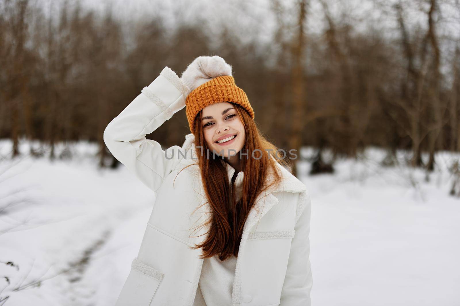 woman Walk in winter field landscape outdoor entertainment Walk in the winter forest. High quality photo