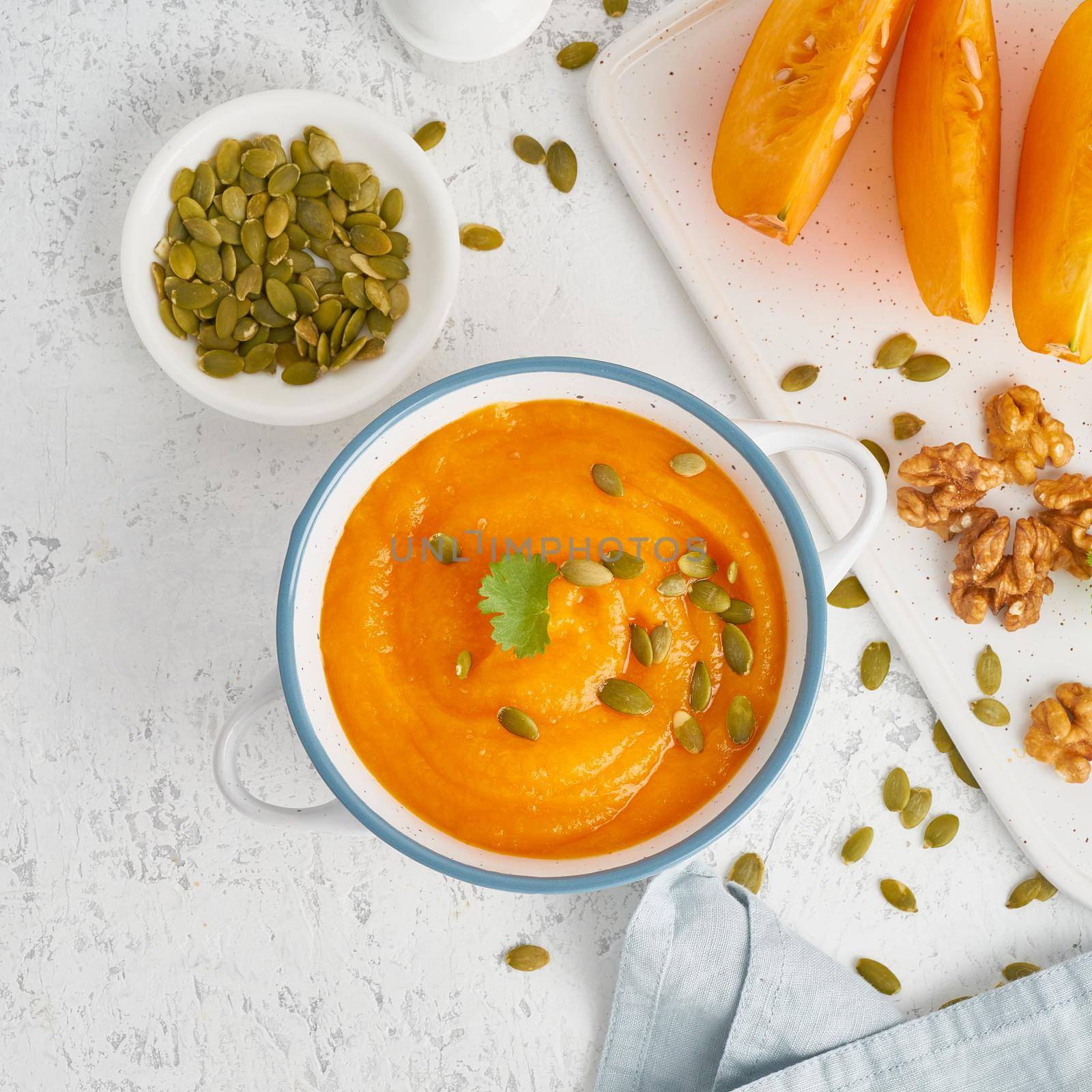 healthy food for vegans, cream soup with walnuts and pumpkin seeds