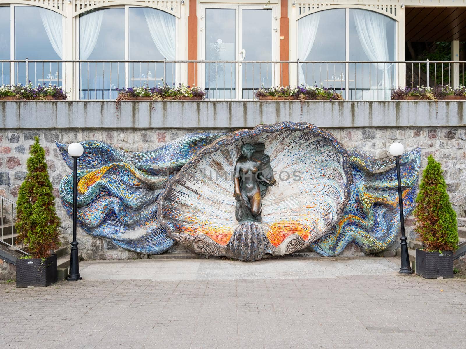 SVETLOGORSK, RUSSIA - July 21, 2019. Sculpture Nymph by Hermann Brachert on sea embankment. by aksenovko