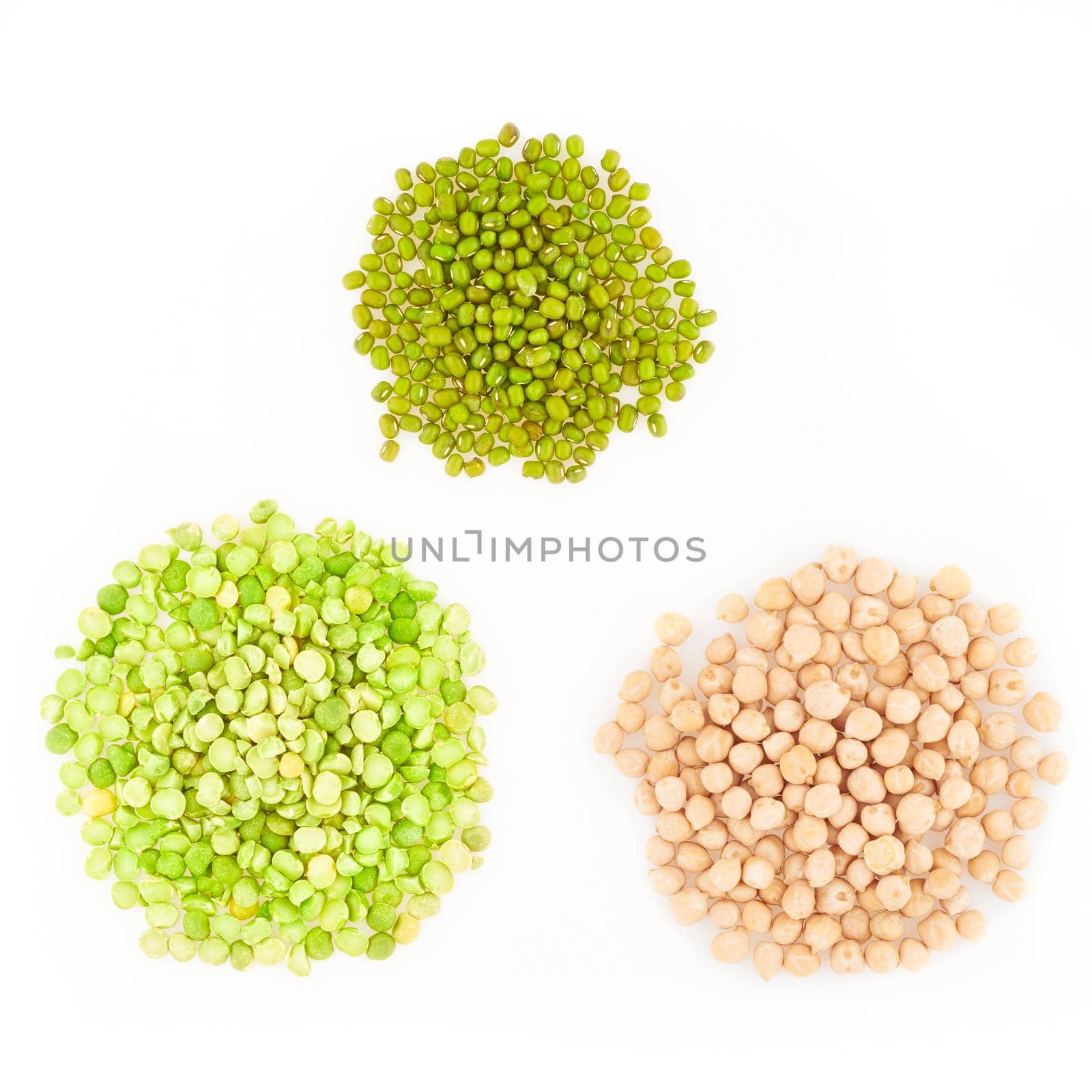 three kinds of raw dried legumes - chickpeas, mung bean, green peas, isolated on white background by NataBene