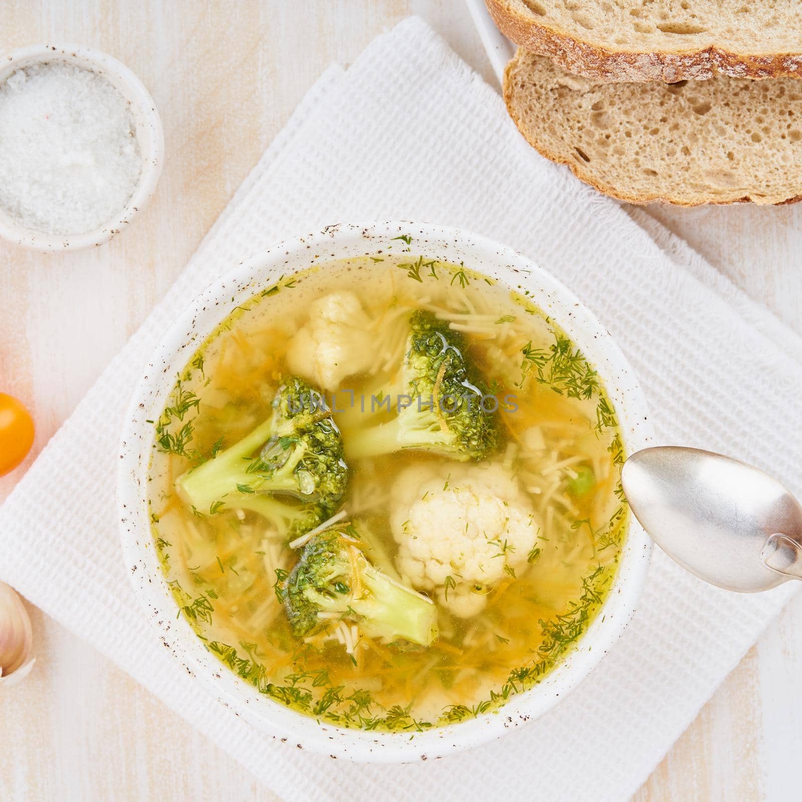 Broccoli soup, healthy spring vegetable dietary vegetarian dish, top view, close up, top view