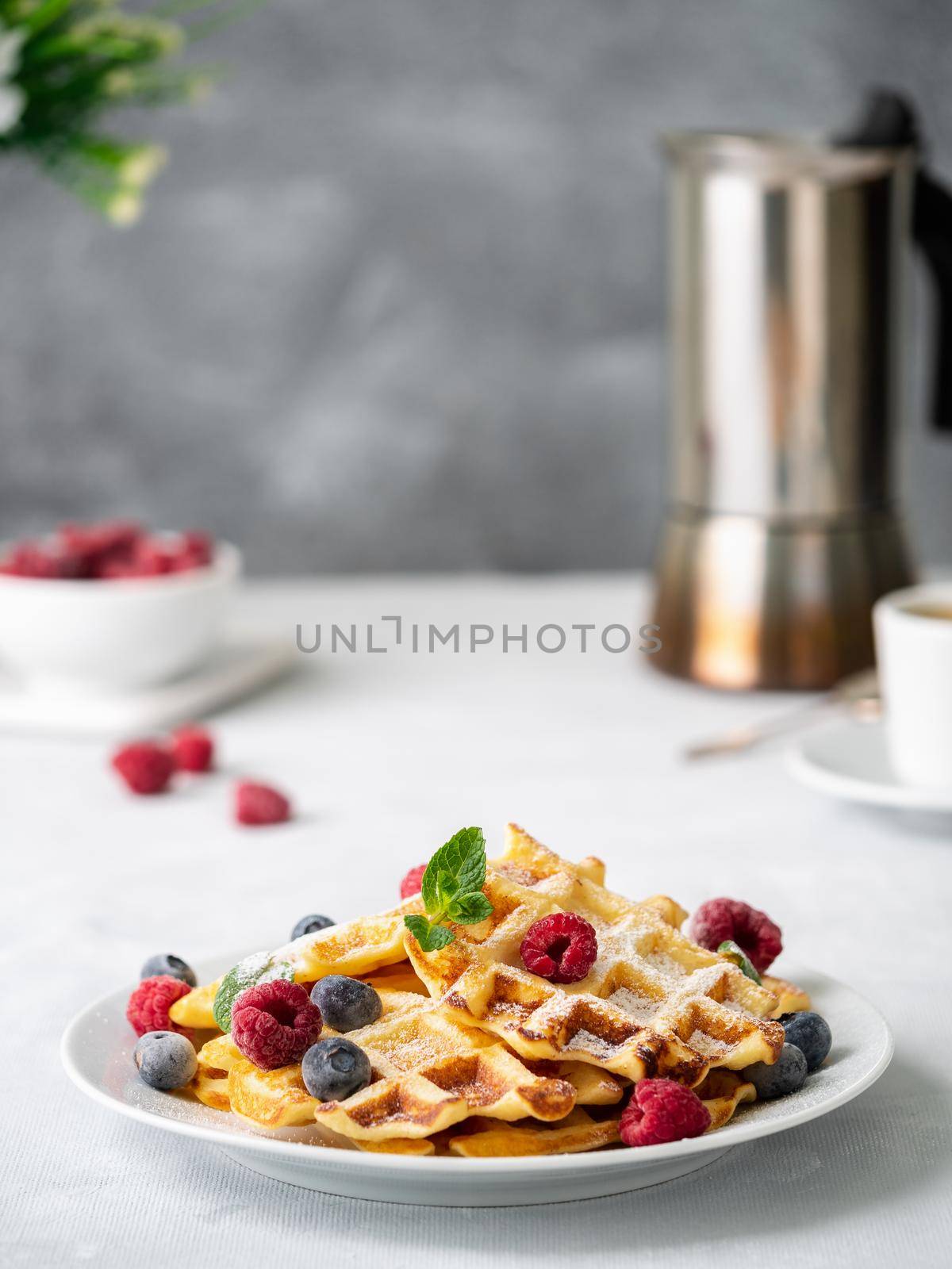 Belgian waffles with raspberries, blueberries, curd and coffee by NataBene