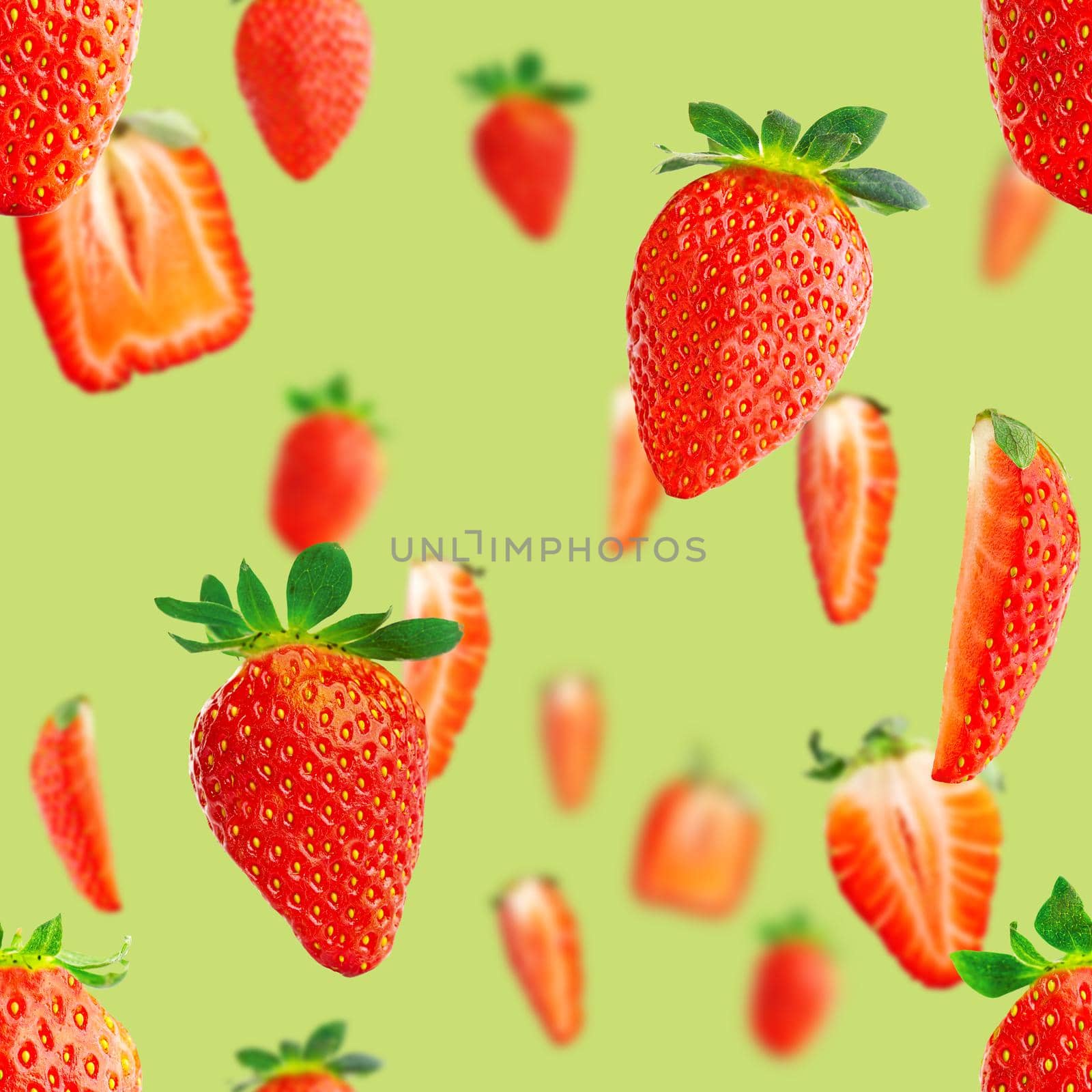Fresh strawberry seamless pattern. Ripe strawberries isolated on green. Package design background. Falling strawberry selective focus.