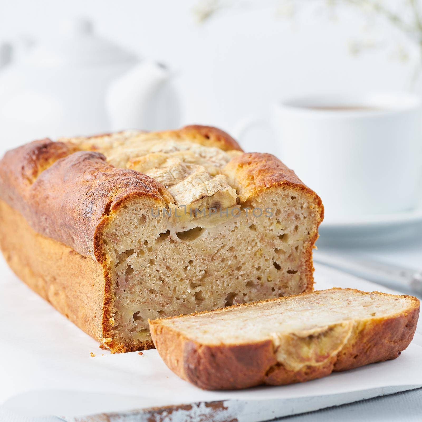 Banana bread, slice of cake with banana, side view, close up. The morning Breakfast by NataBene