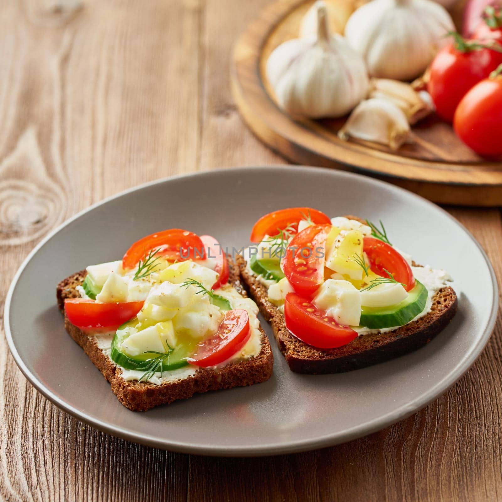 Smorrebrod - traditional Danish sandwiches. Black rye bread with boiled egg by NataBene