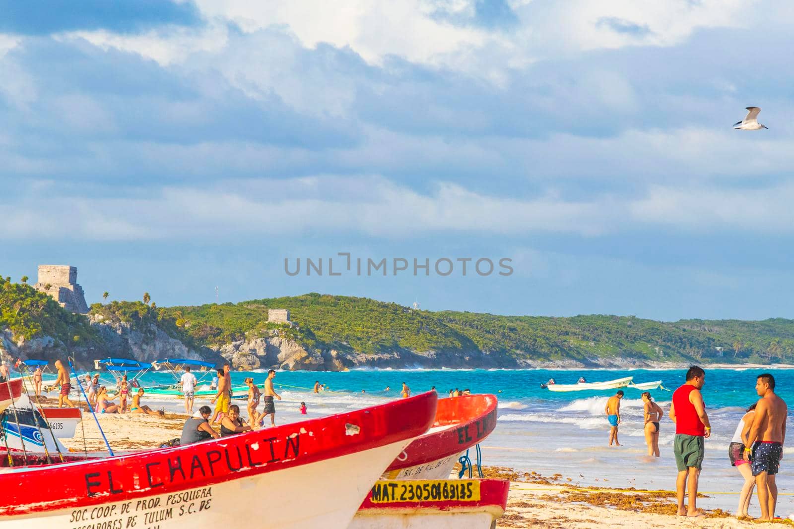 Tulum Mexico 02. February 2022 Amazing and beautiful caribbean coast and beach panorama view with turquoise water waves and boats of Tulum in Quintana Roo Mexico.