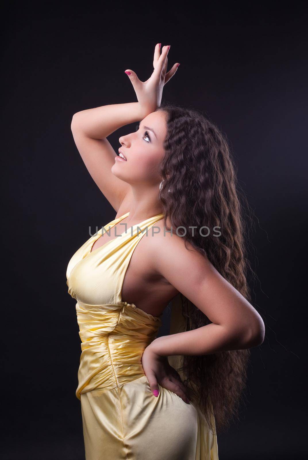 Beauty woman dance in yellow cloth by rivertime