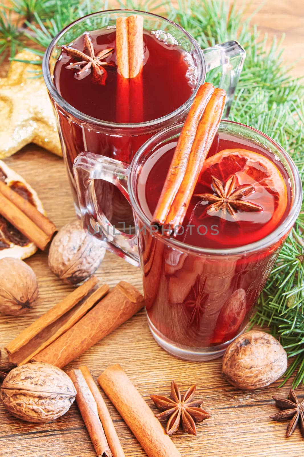 Christmas mulled wine. Merry Christmas. Glass of mulled wine with cinnamon and anise, top view. Selective focus.Holiday