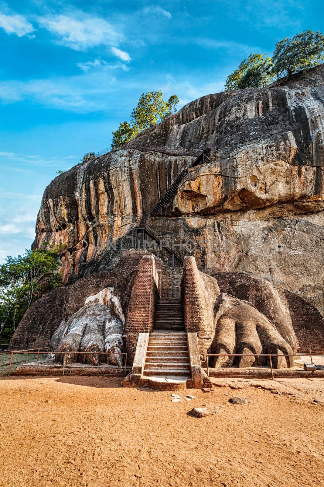 Famous Sri Lankan tourist landmark - lion's paws pathway on Sigiriya rock, Sri Lanka