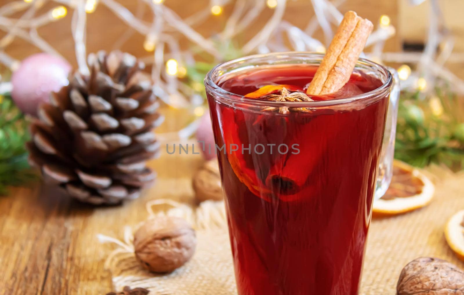 Christmas mulled wine. Merry Christmas. Glass of mulled wine with cinnamon and anise, top view. Selective focus.Holiday