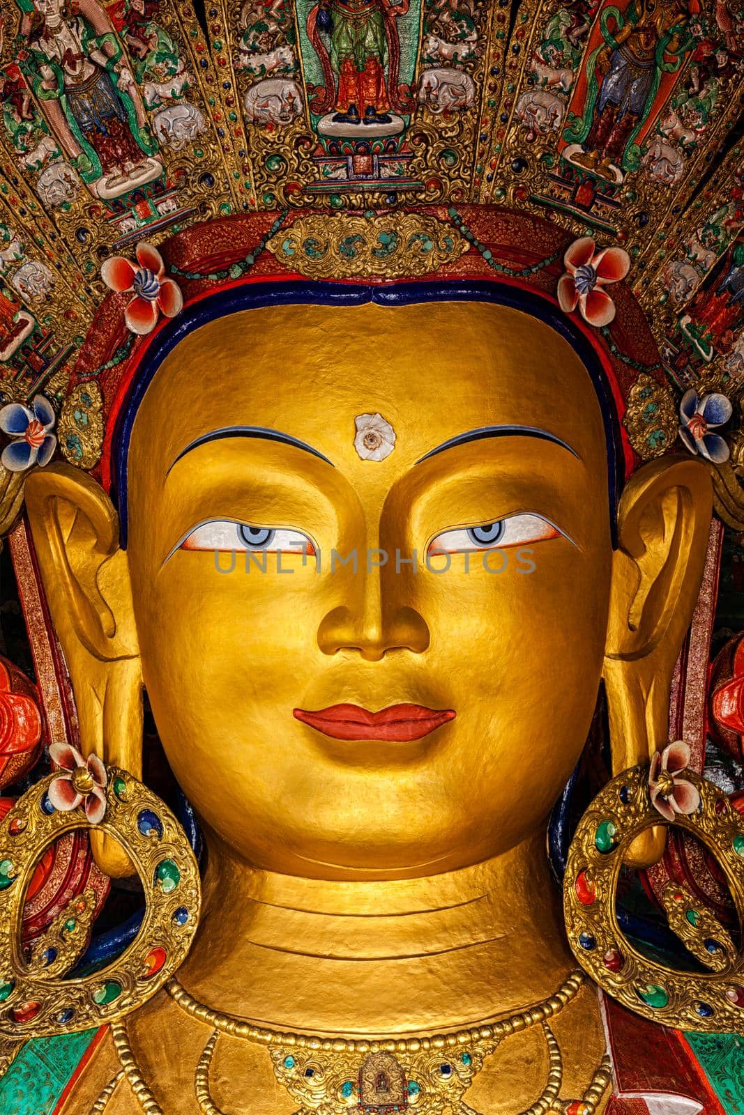 Maitreya Buddha statue face close up in Thiksey Gompa. Ladakh, India