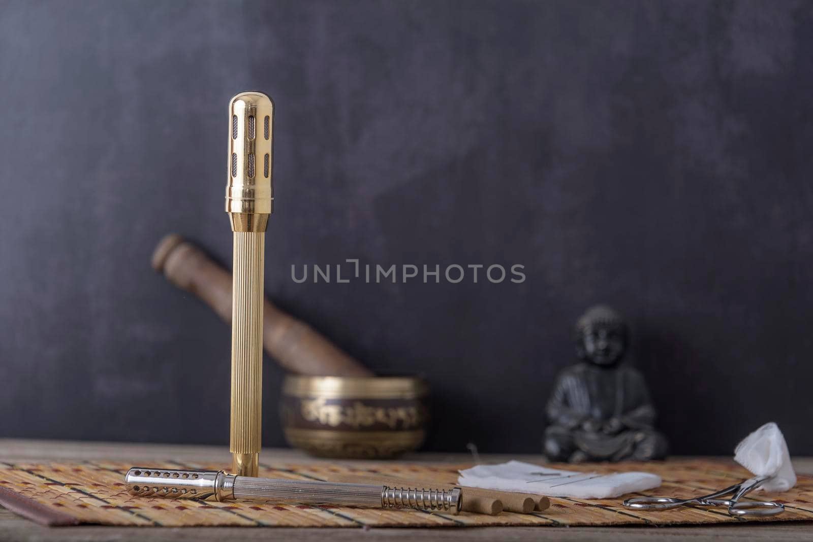 Chinese copper moxibustion box with smoke on bamboo. by jbruiz78