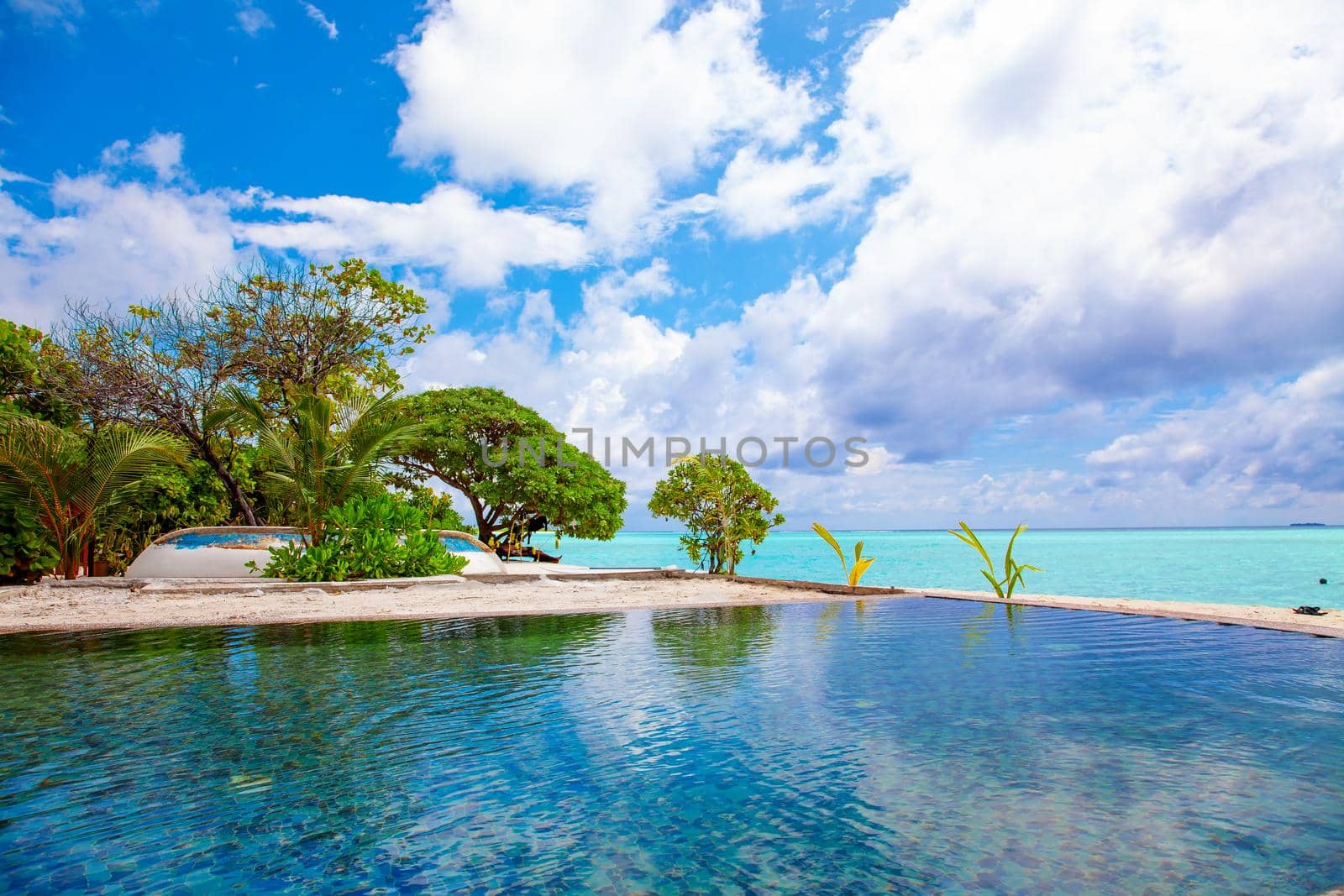 Wild Tropical cloudy lanscape with blue sea