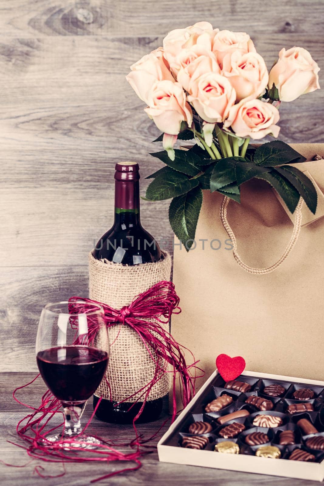 Wine and box of chocolates by lndstudio