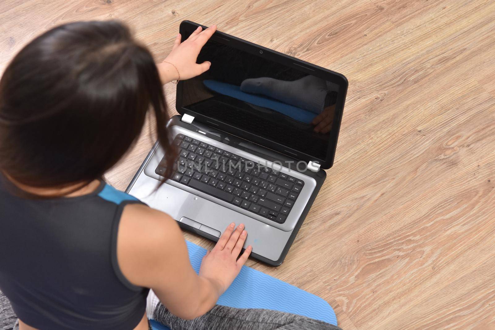 Young asian woman making online training yoga by Bonda