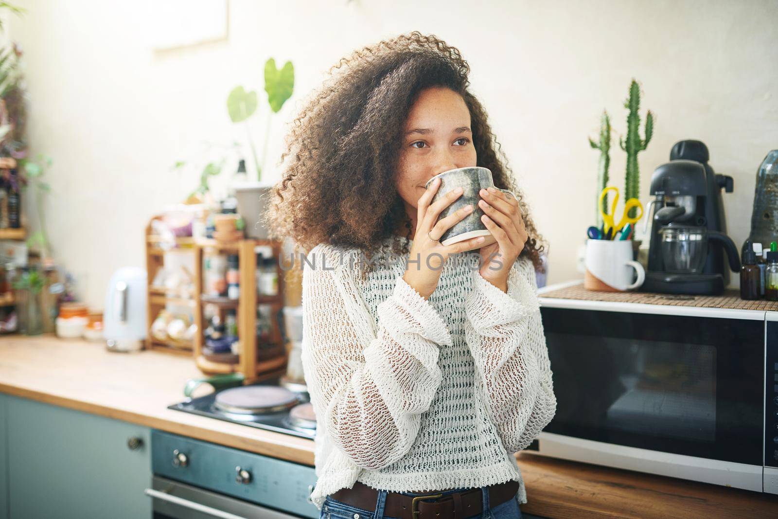 Portrait of a beautiful girl enjoying her coffee