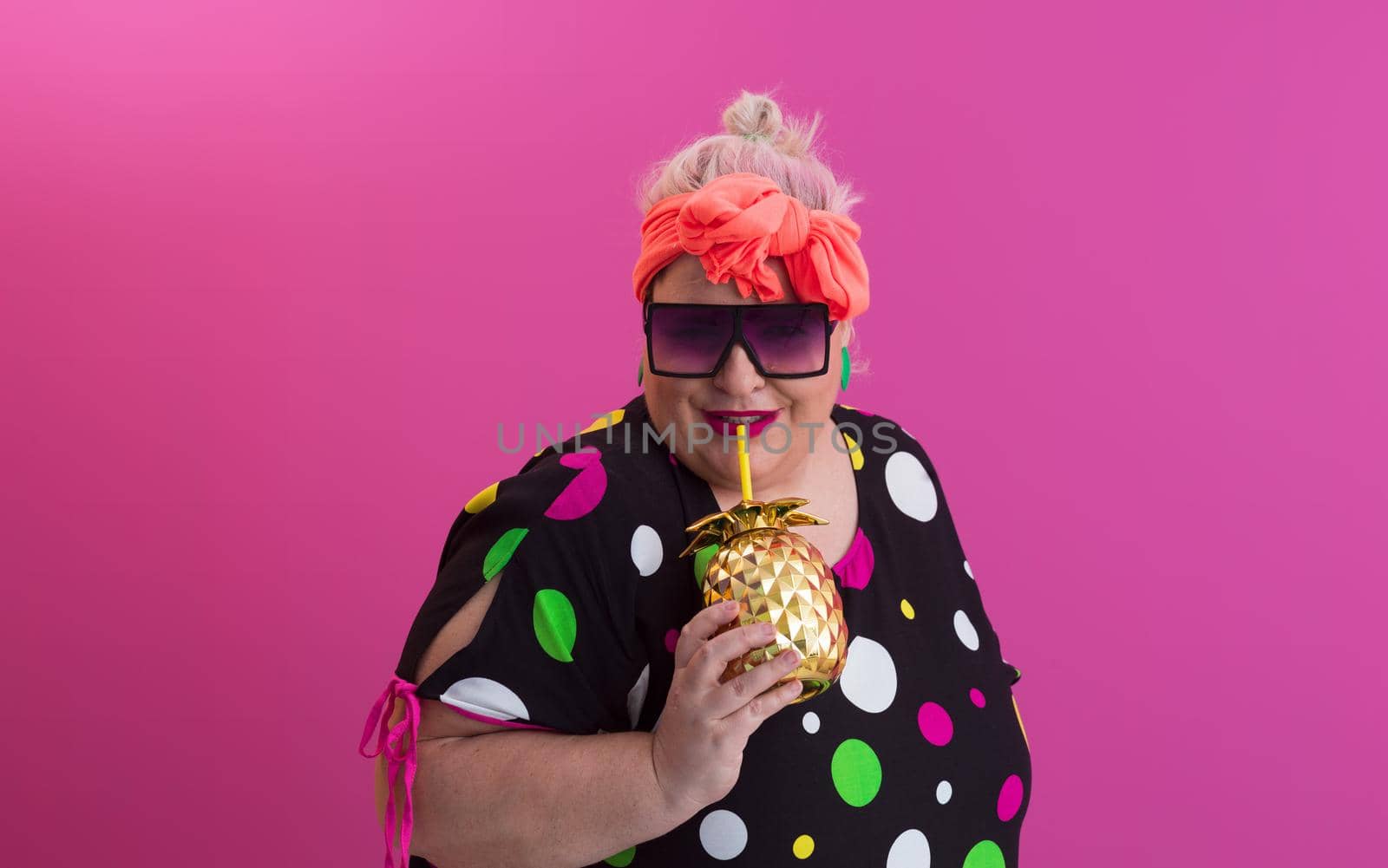 Overweight plus size female, fat women, Fat girl, Chubby, holding golden fruit ananas isolated on pink background - lifestyle Woman diet weight loss overweight problem concept. High quality photo