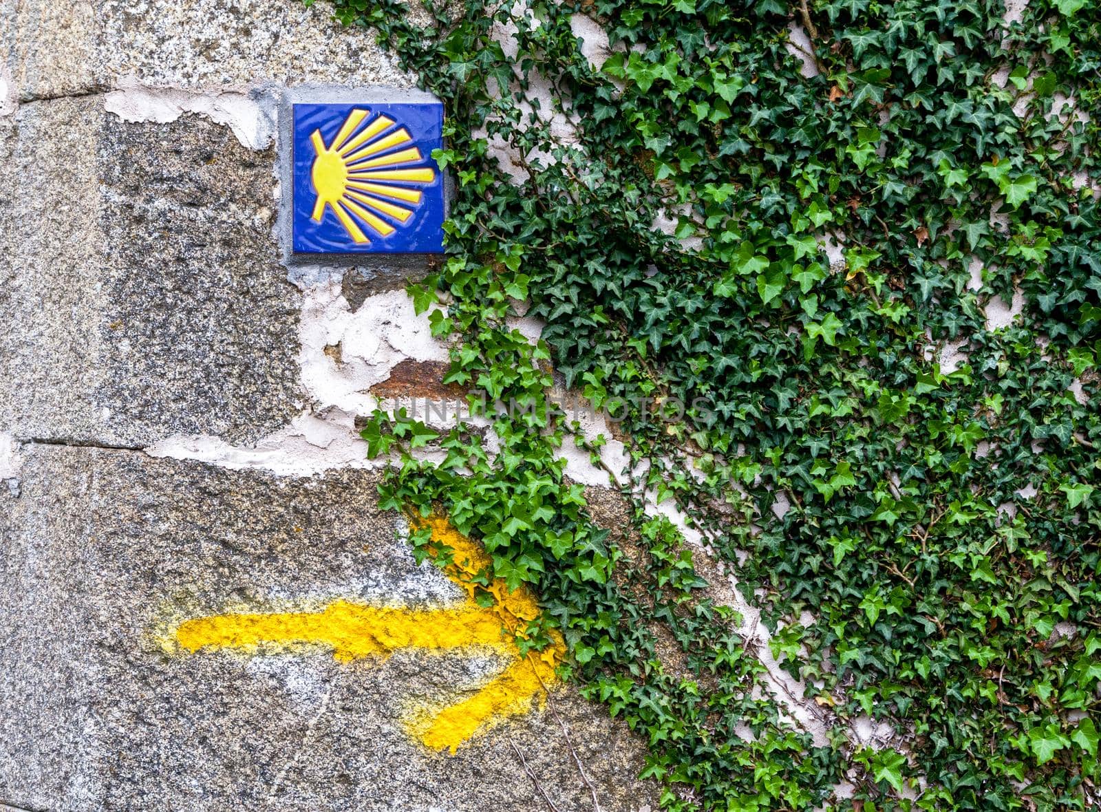 Road sign of Camino de Santiago, pilgrimage route to the Cathedral of Santiago de Compostela