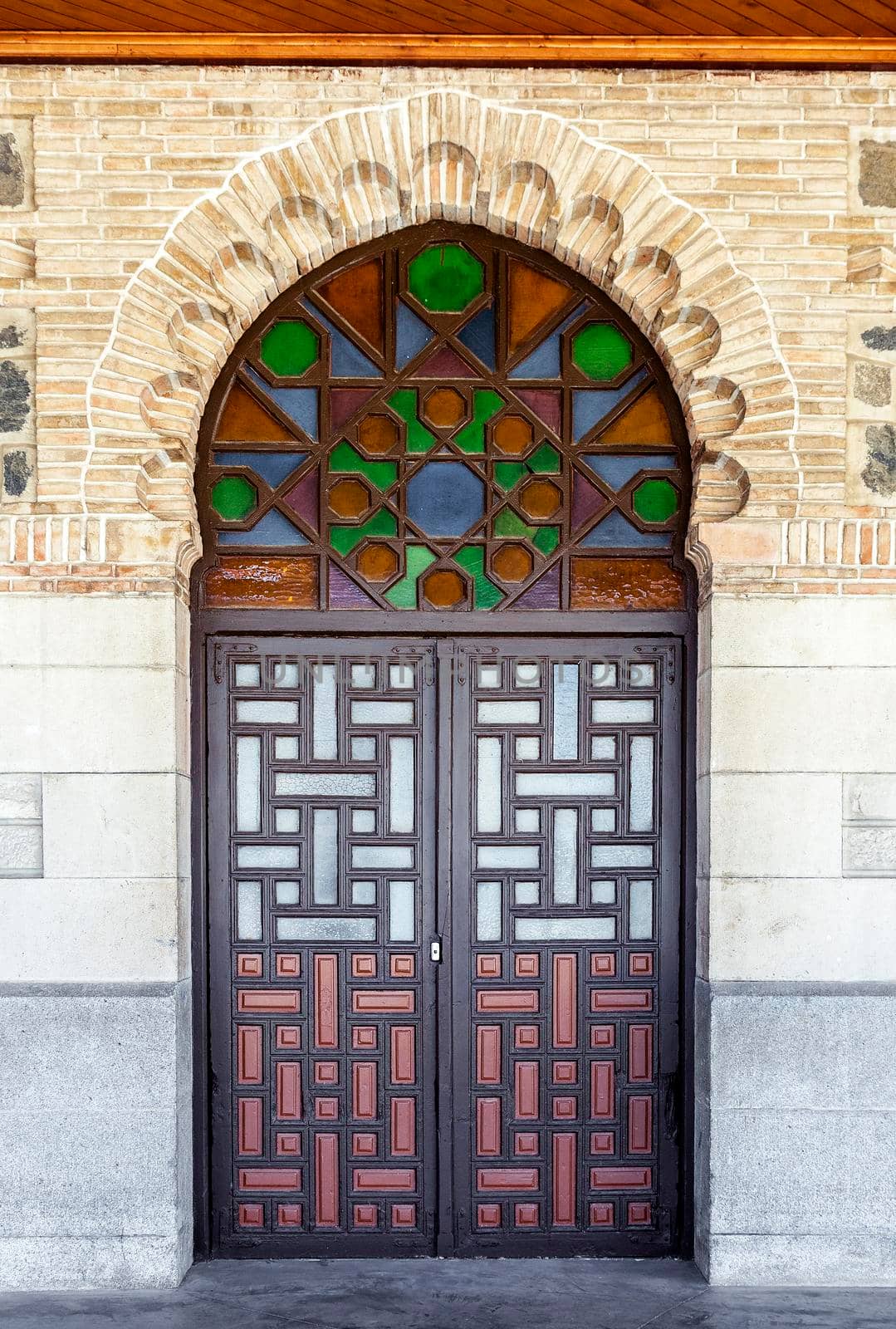 Ornate door in moorish style in Toledo railway station by Goodday