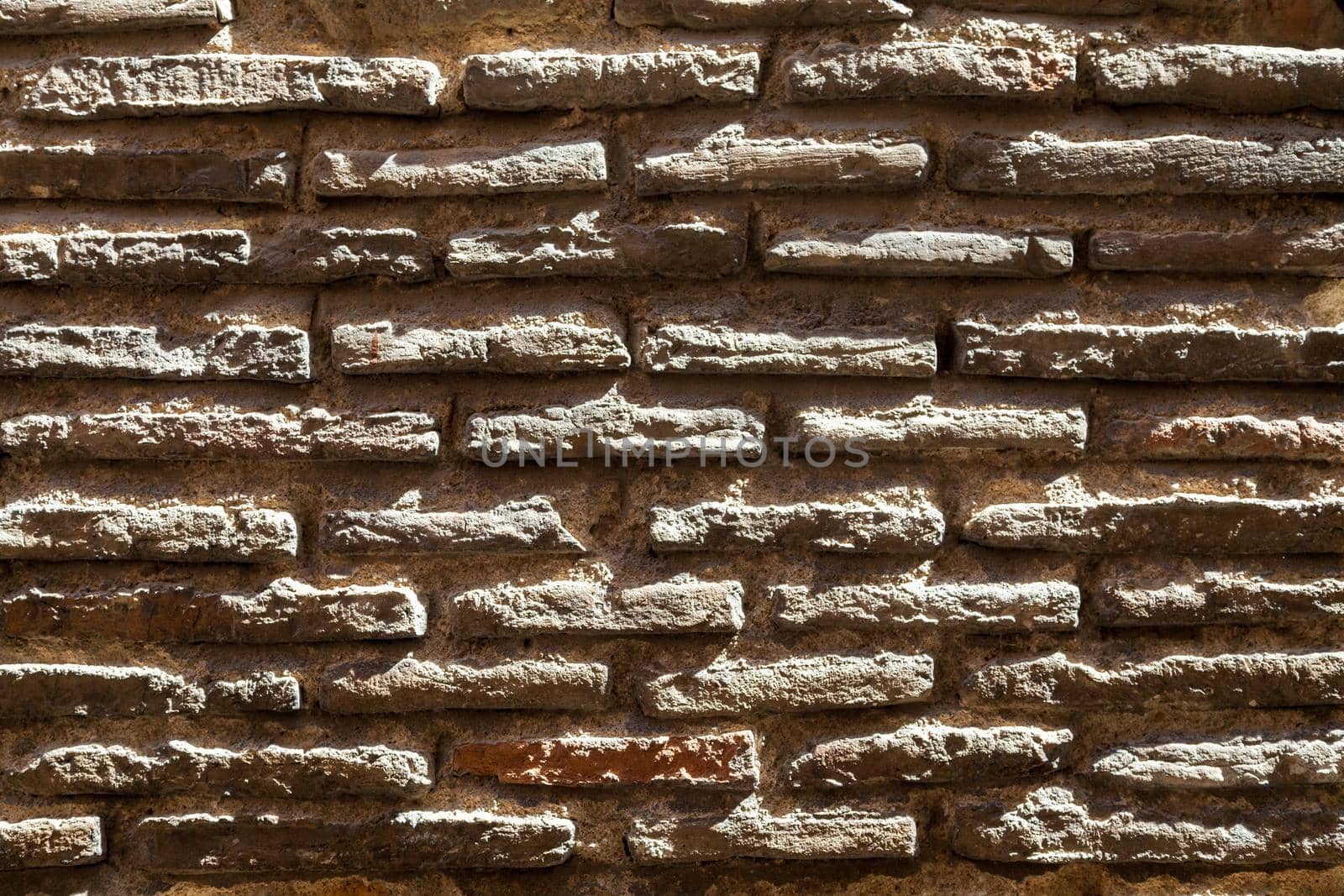 Close-up of old wall with brickwork for texture or background