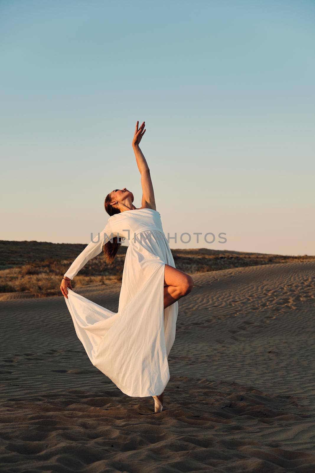 Dances in the desert in white dress by snep_photo