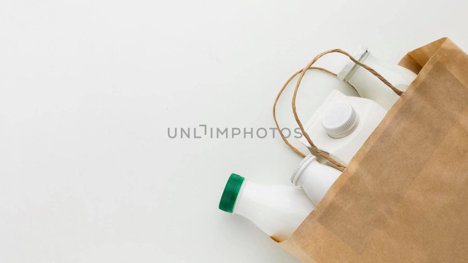 top view paper bag with milk bottles