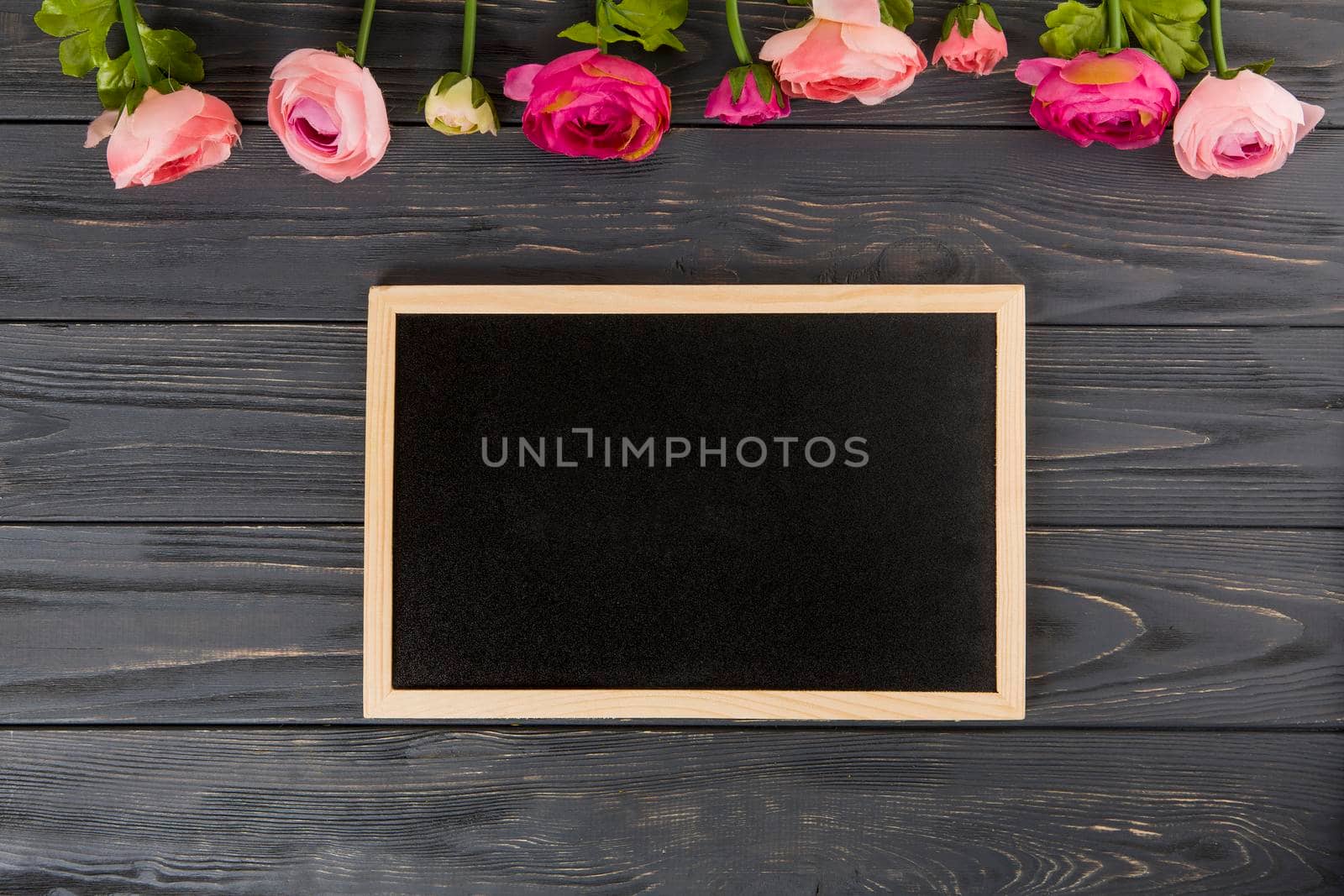 rose flowers with big chalkboard wooden table by Zahard