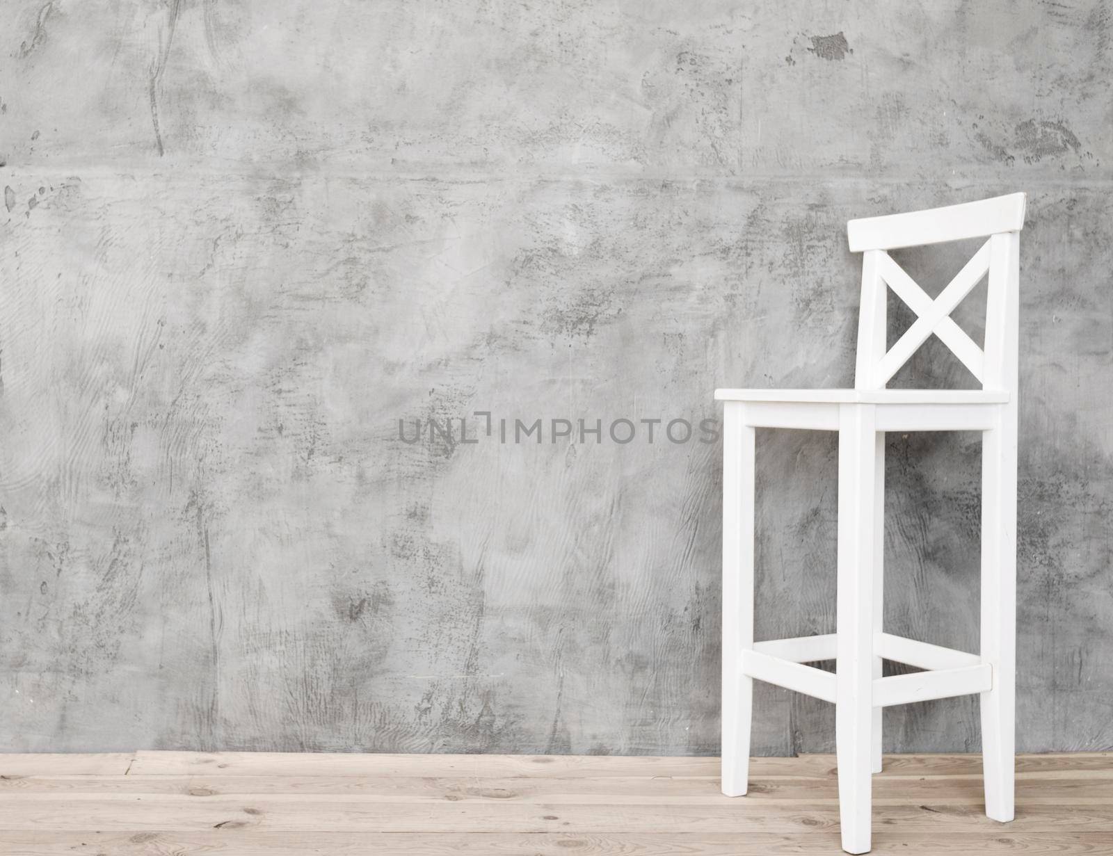 minimalist white stool with concrete panels