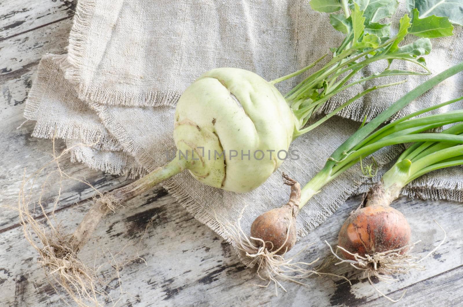 Fresh vegetables on old wooden table. From the series "Autumn vegetables"