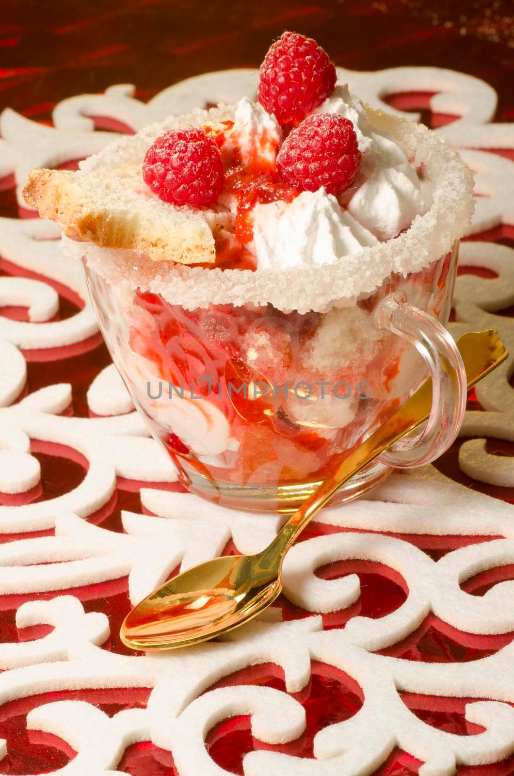 Christmas dessert in a glass with decoration. From series "Cranberry-raspberry trifle"