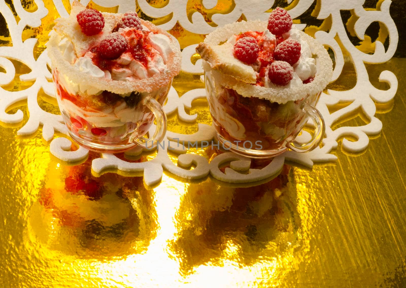 Christmas dessert in a glass with decoration. From series "Cranberry-raspberry trifle"