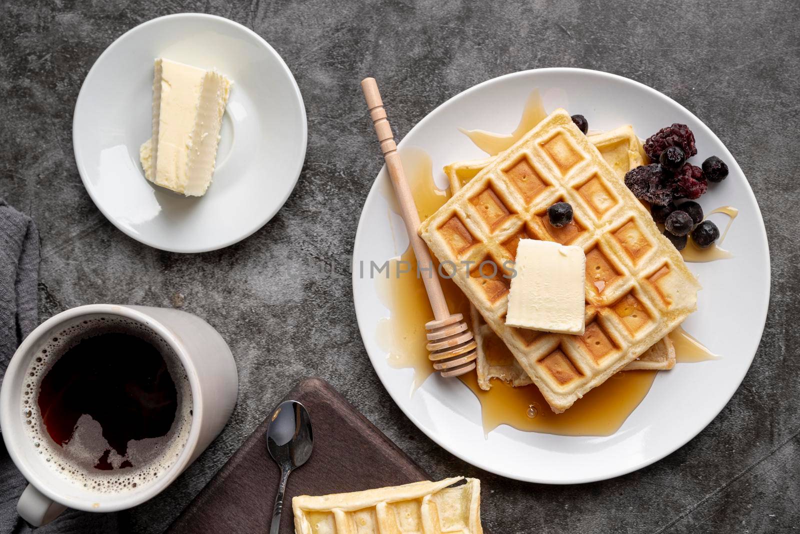 top view waffles plate with butter cup tea by Zahard