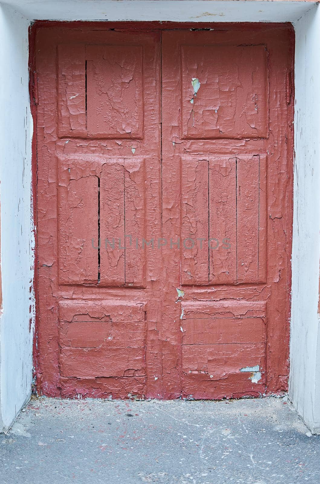 old cracked red door on the front of the house by NataBene