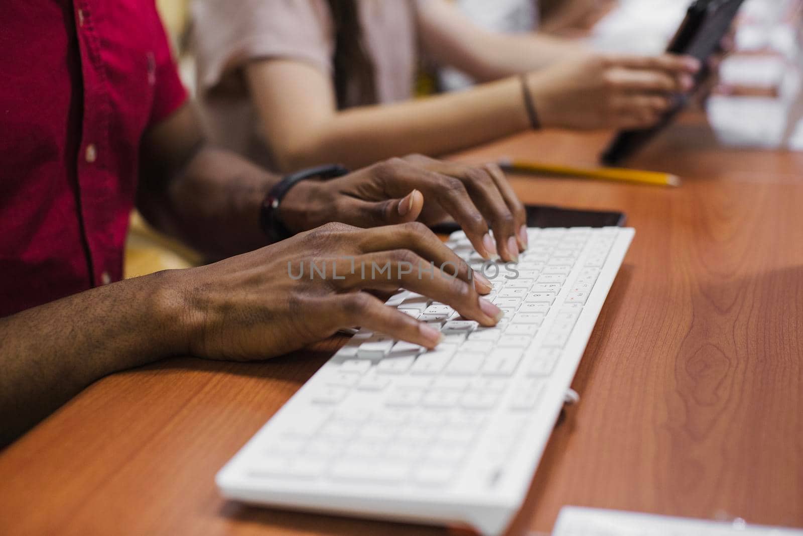 anonymous black man typing