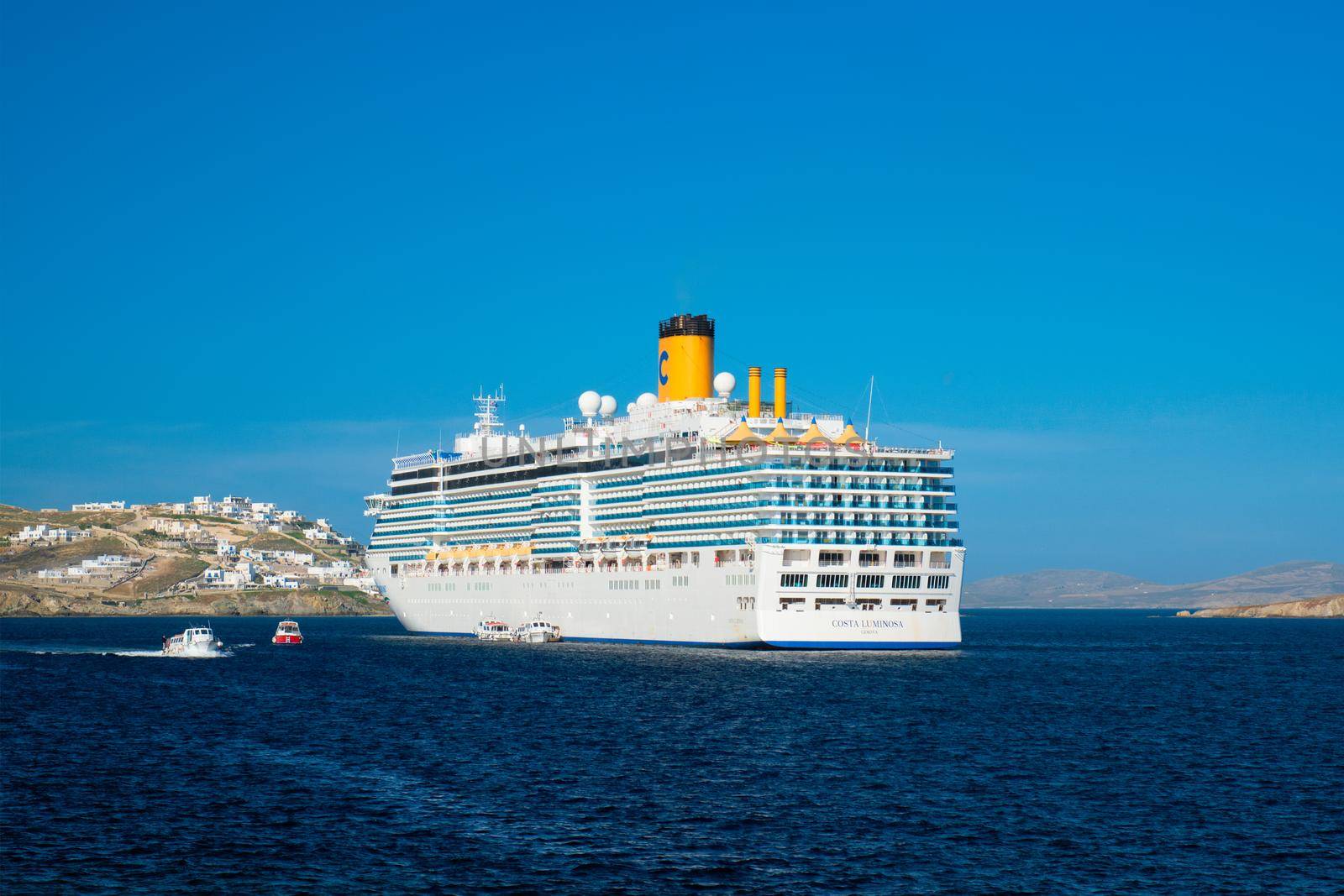 Cruise liner ship Costa Luminosa in Mediterranea sea near Mykonos island. Aegean sea, Greece by dimol