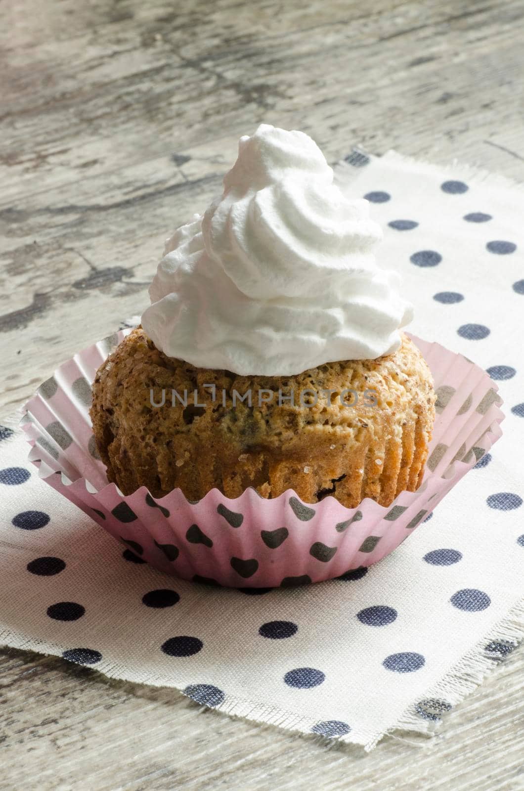 Pumpkin muffins on the table. From the series "Pumpkin Cupcakes"